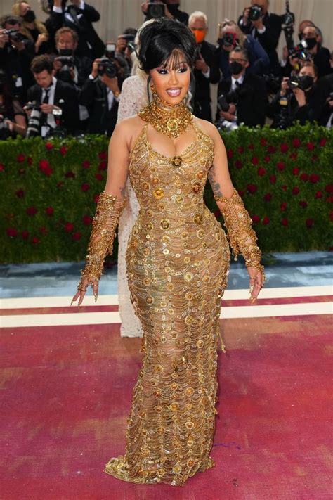 versace gold chain dress.